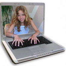 Girl with computer typing